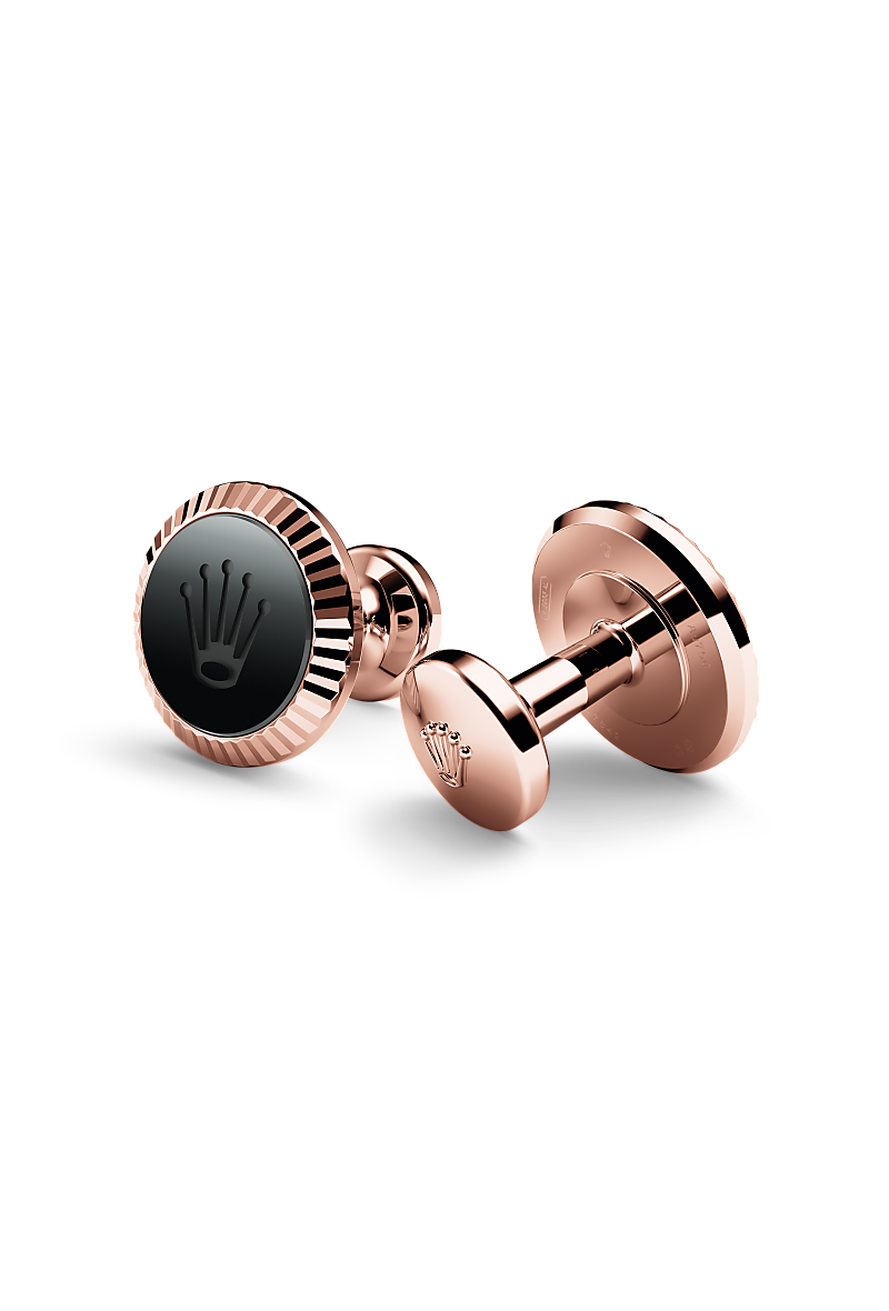 Gemelos Rolex fabricados en oro Everose de 18 quilates, que presentan el característico acanalado Rolex, el disco Cerachrom y la corona Rolex.